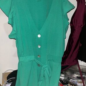 Green flutter sleeve blouse